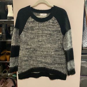Black with gray and white variegated knit sweater. Size S